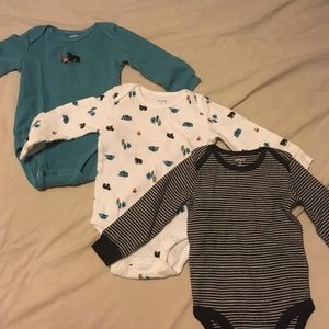 3 Carter's long sleeve Onesie